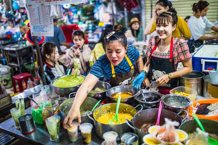 Street food vendors serving Vietnamese fast food